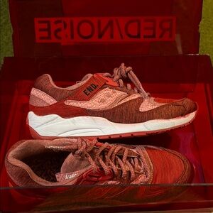 Saucony Red Sneakers Vibrant Athletic Style with hard case